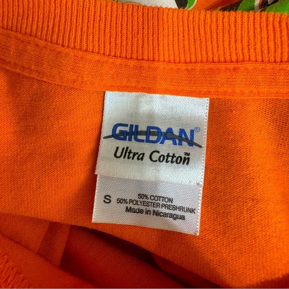 Girlie Girl Originals “I dress real cute but I know how to shoot” Orange Tee - Picture 5 of 7